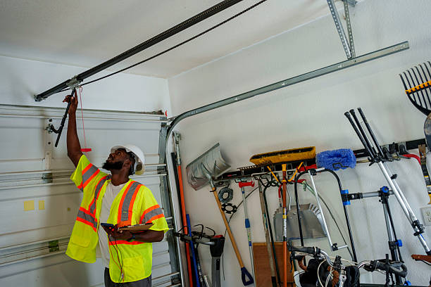 Professional Garage Door Panel Replacement technician working in Seaside, OR